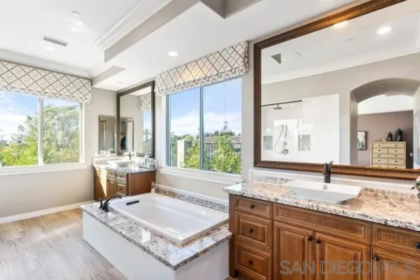 a bedroom with a bed and dresser