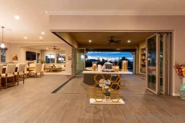 a view of a swimming pool with a patio