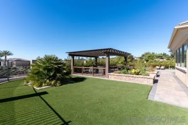 an aerial view of a house with a garden