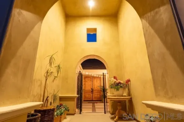 a view of a balcony with chairs