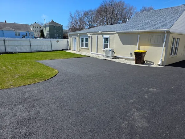 a house that has a big yard in front of it