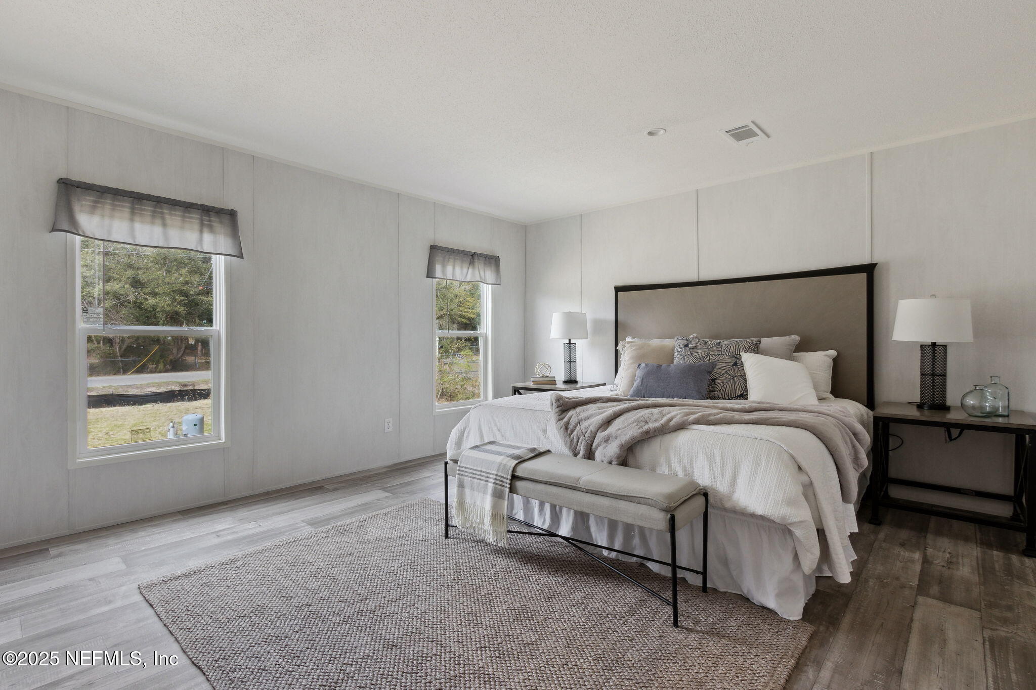 87454 Haven Road Yulee, FL 32097 - Photo 14 of 38 a bed room with a bed and a window