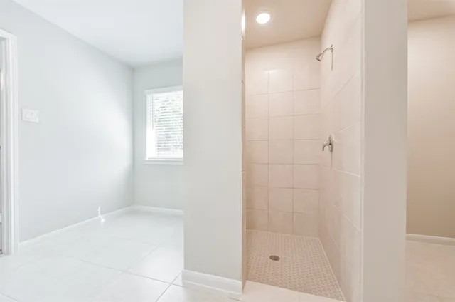 a view of a room with racks on the wall