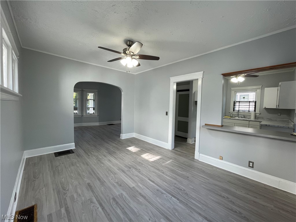 Dining room looking into living room and kitchen