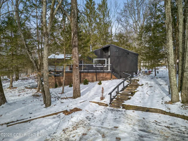a patio with table and chairs