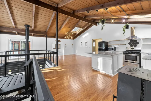 a view of a chair and table in the balcony
