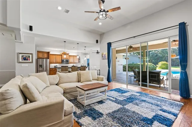 a bedroom with a bed a window and dresser