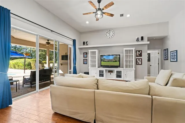a view of a living room and bathroom
