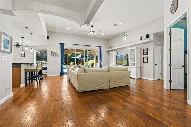 a kitchen with granite countertop cabinets stainless steel appliances and a counter space