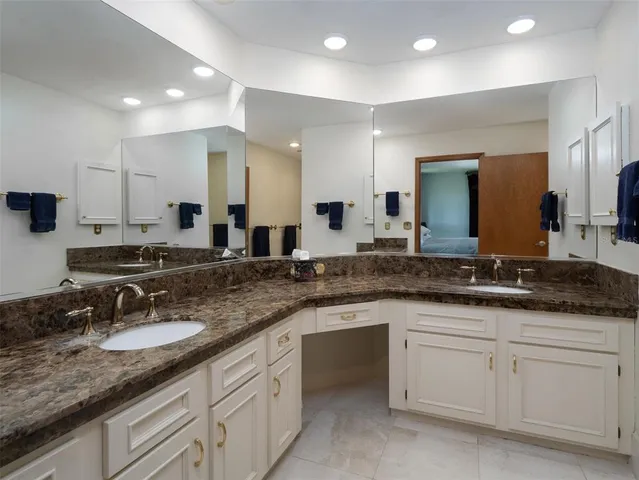 a spacious bathroom with a bathtub and a shower