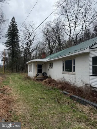 a house view with a backyard space