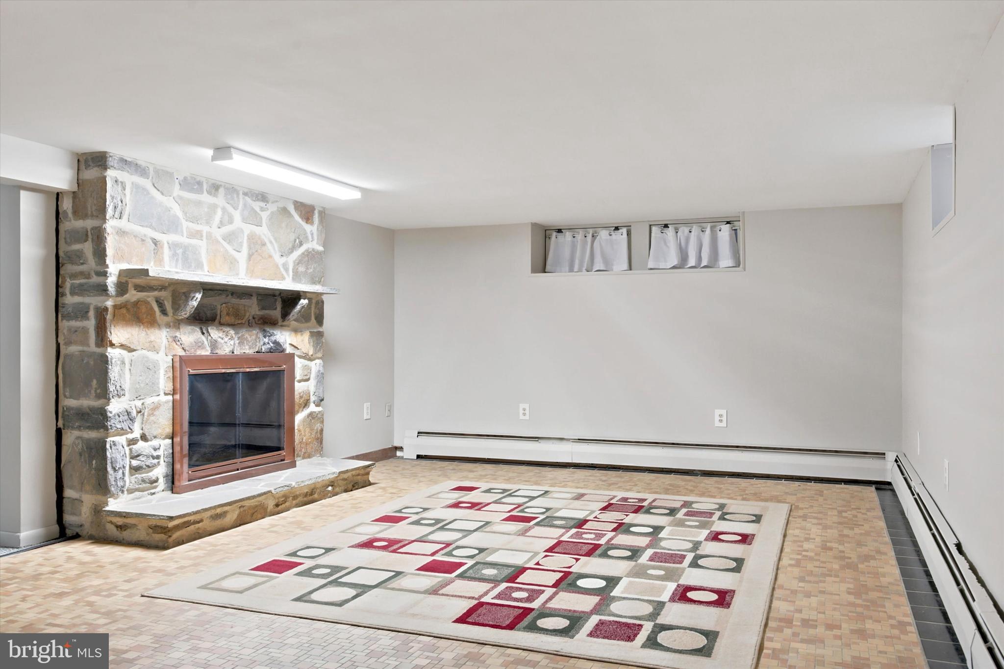 276 Ellis Road Havertown, PA 19083 - Photo 28 of 36 Family / Rec room with stunning stone fireplace