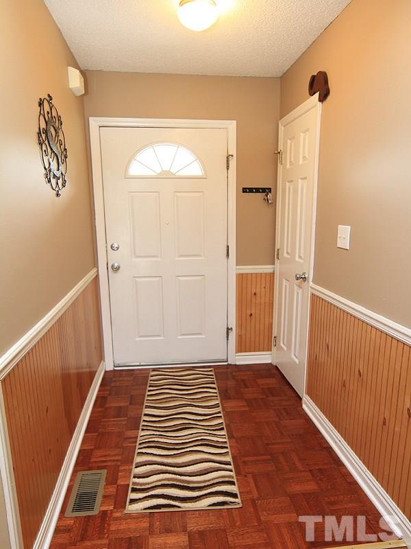 4009 Rockside Hills Drive Raleigh, NC 27603 - Photo 5 of 25 a view of a hallway