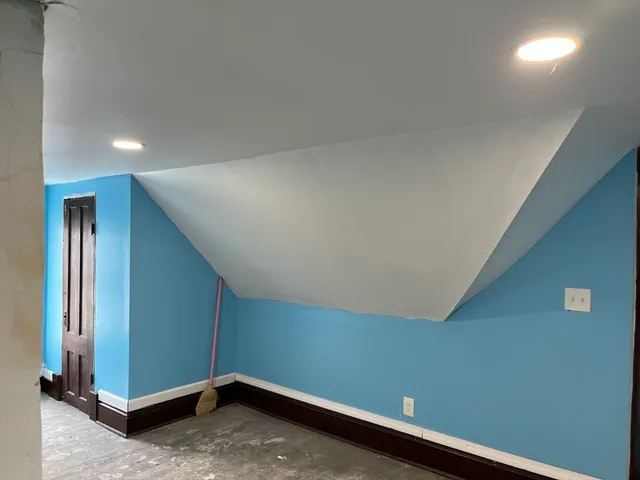 a view of a room with a window