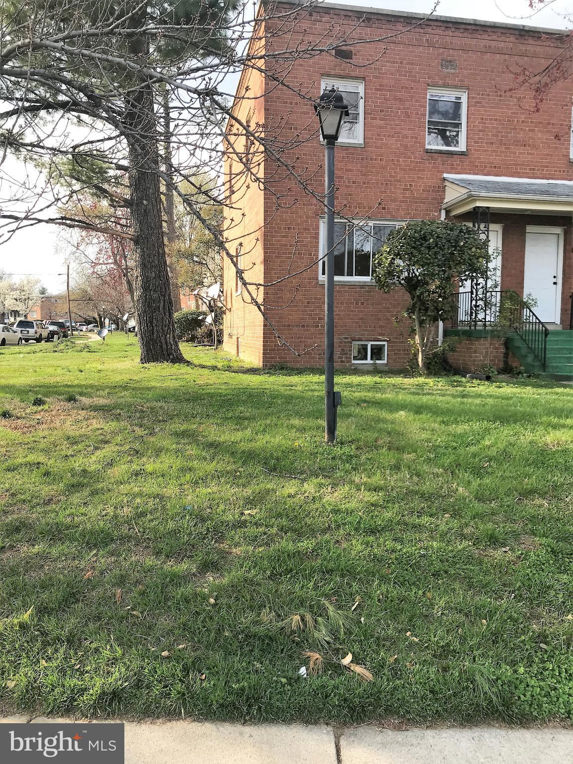 7900 Riggs Road Hyattsville, MD 20783 - Photo 2 of 9 a view of a house with a backyard