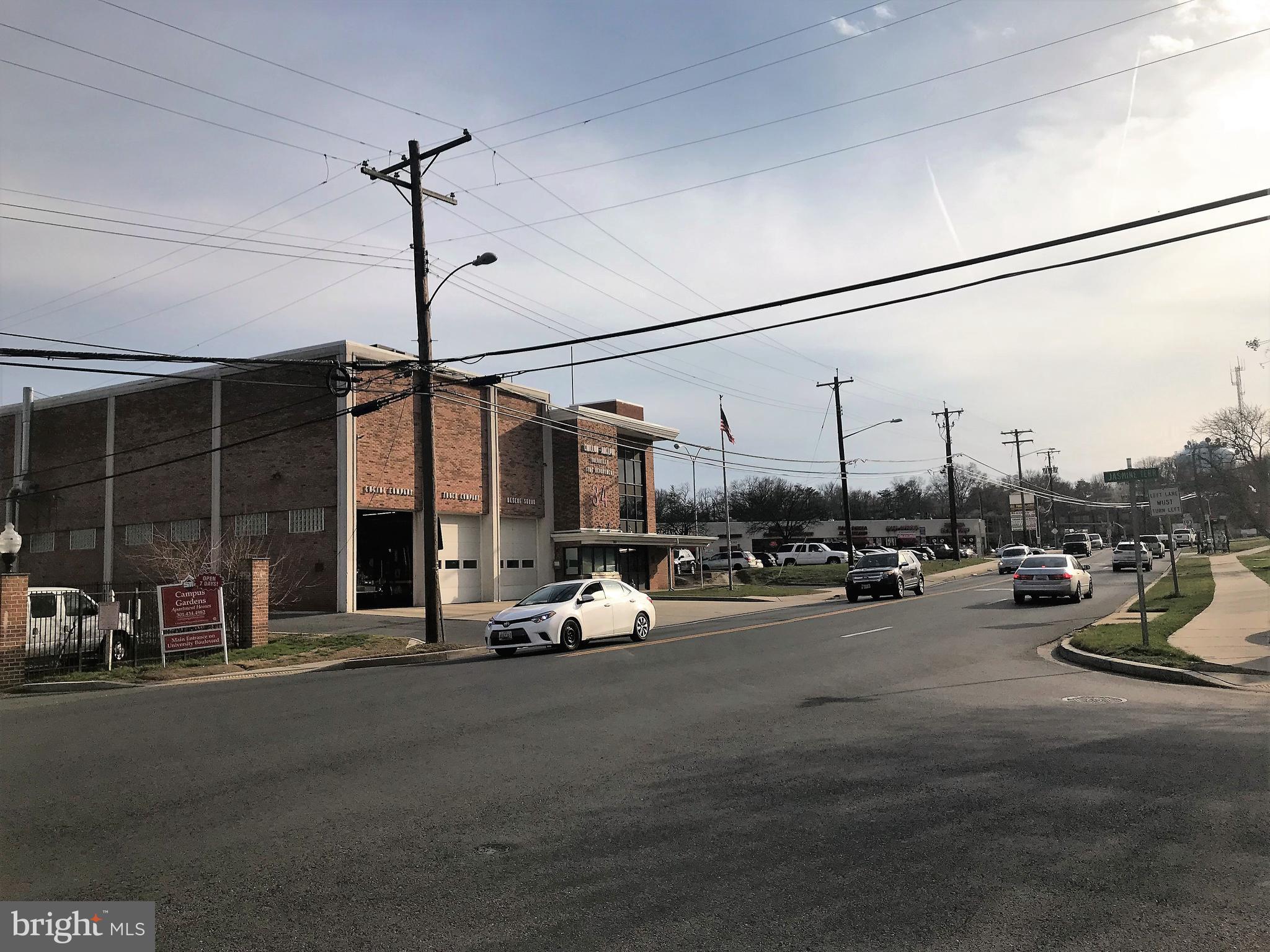 7900 Riggs Road Hyattsville, MD 20783 - Photo 5 of 9 a view of a road with a car parked on the road