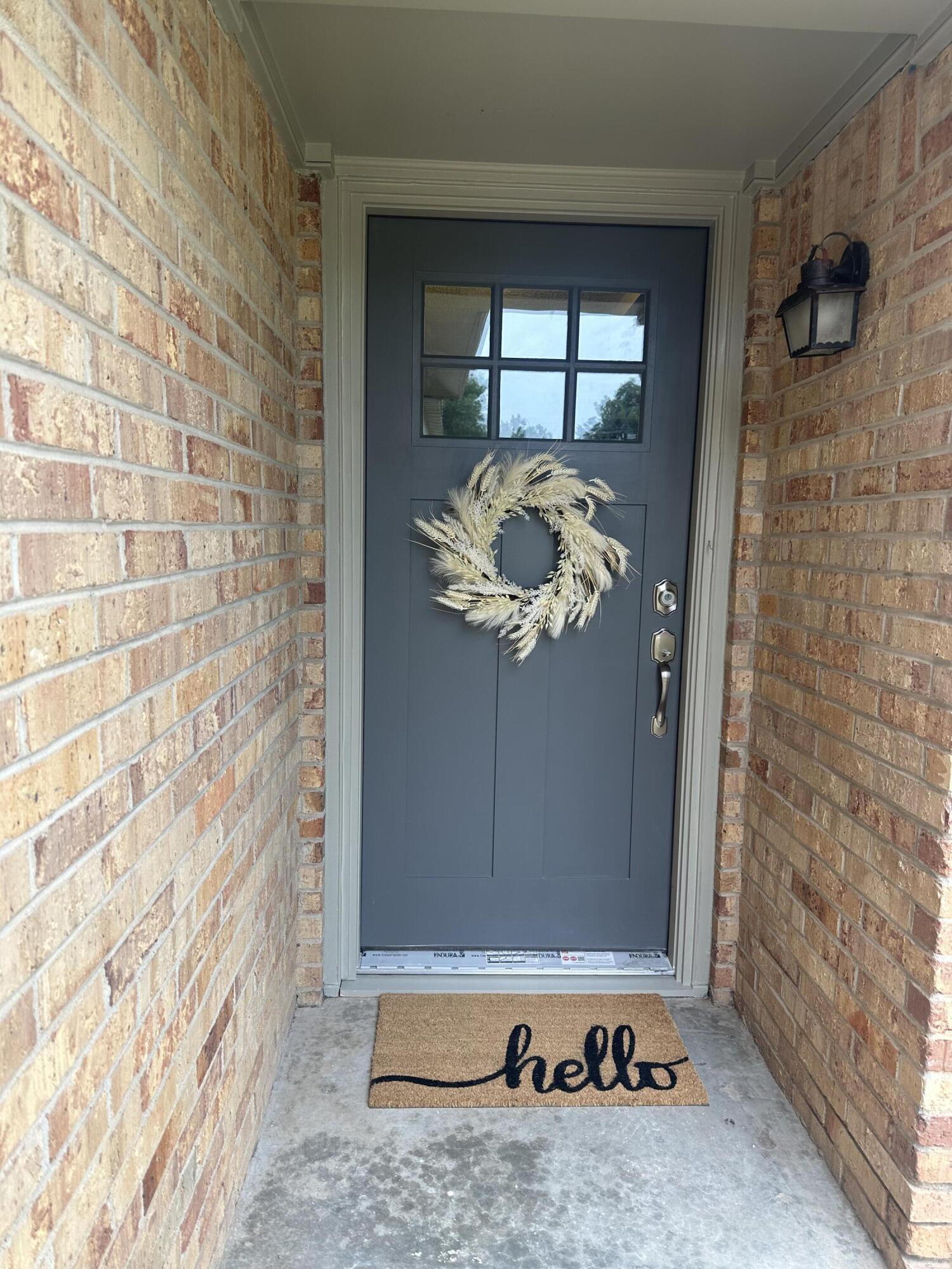 816 Cedar Street Floydada, TX 79235 - Photo 3 of 24 a view of a door of the house