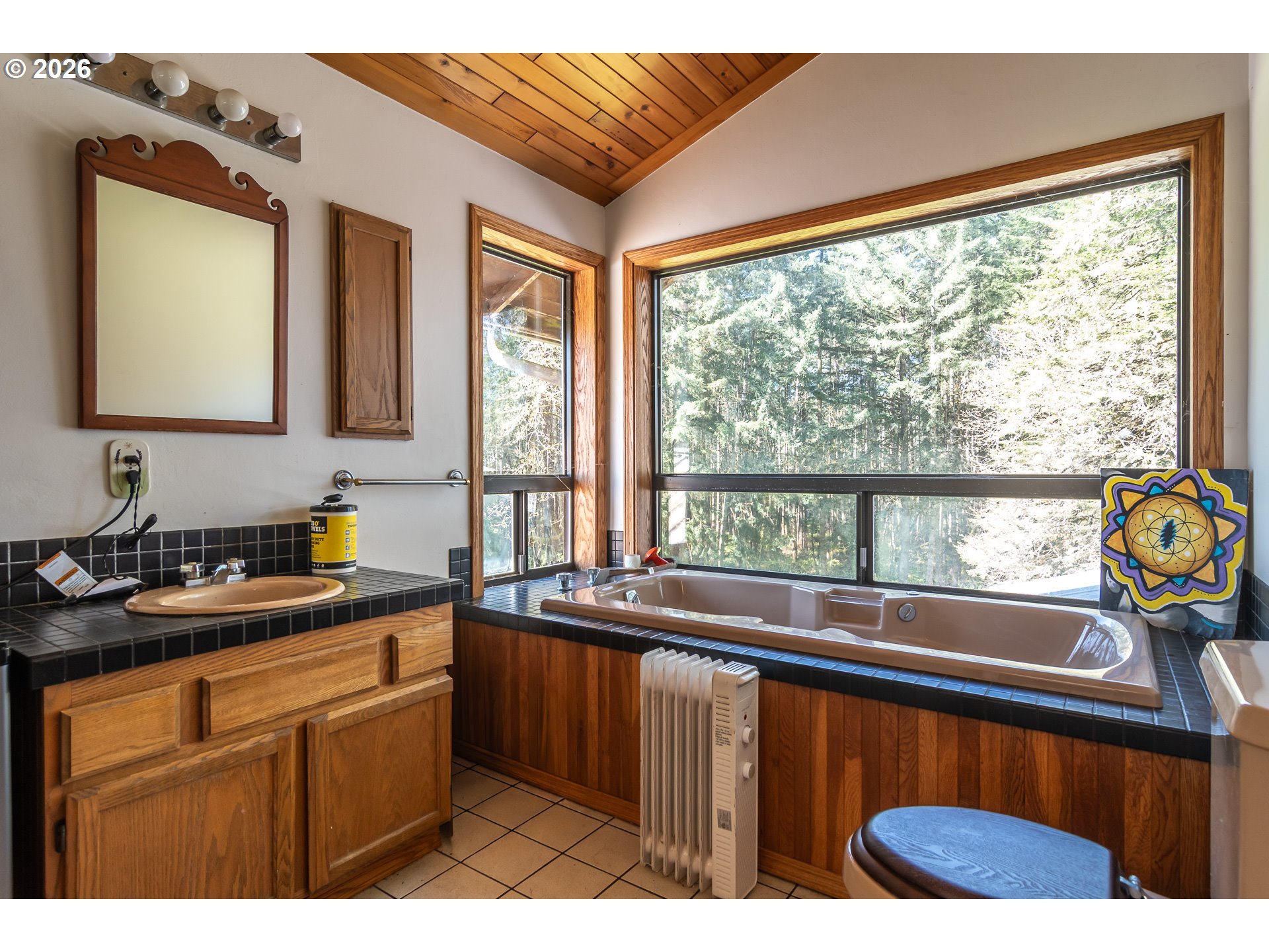 4890 Henderer Road Elkton, OR 97436 - Photo 14 of 48 a kitchen with a sink and a large window