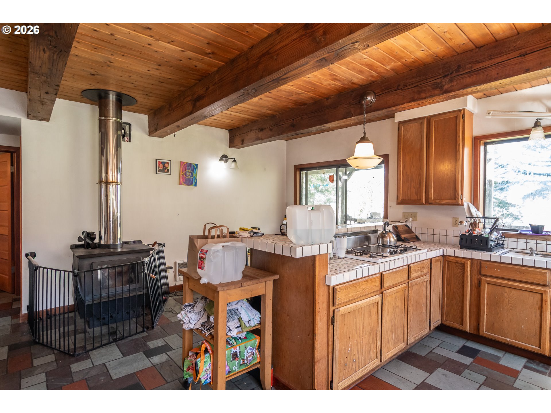 4890 Henderer Road Elkton, OR 97436 - Photo 2 of 48 a kitchen with sink and cabinets