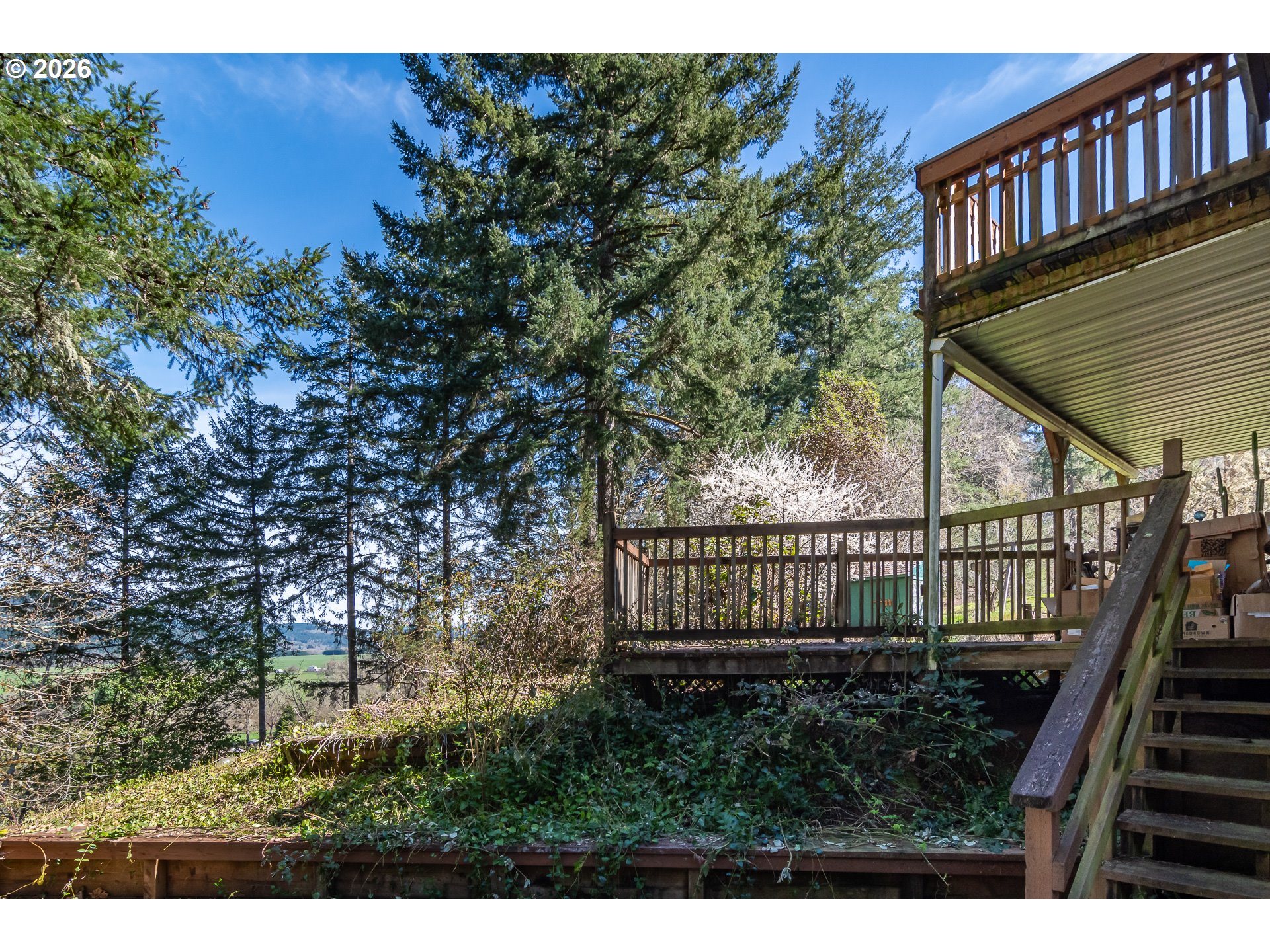 4890 Henderer Road Elkton, OR 97436 - Photo 21 of 48 a view of entryway with wooden stairs
