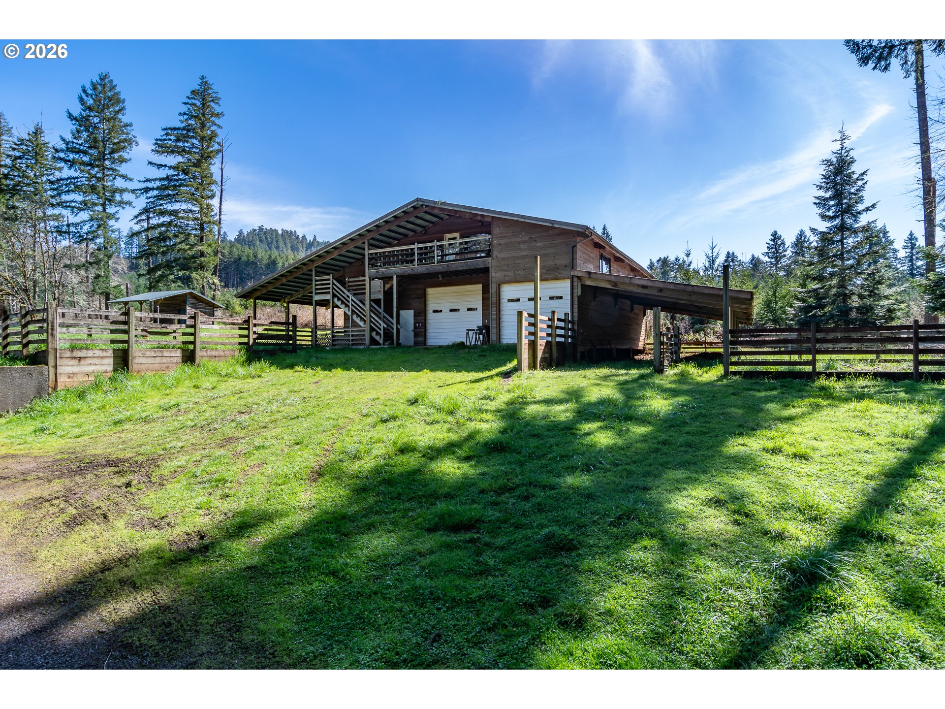 4890 Henderer Road Elkton, OR 97436 - Photo 35 of 48 a view of a house with a yard
