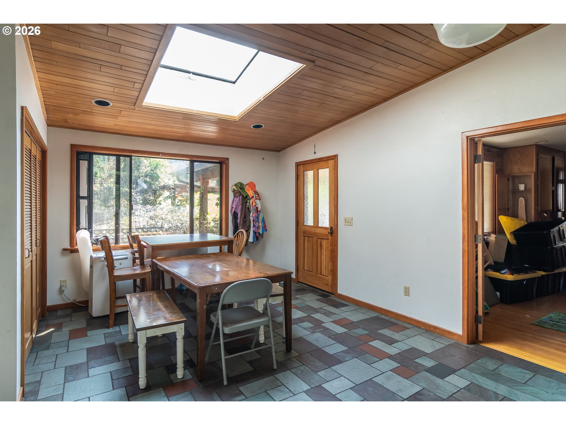 4890 Henderer Road Elkton, OR 97436 - Photo 6 of 48 a dining room with furniture and window