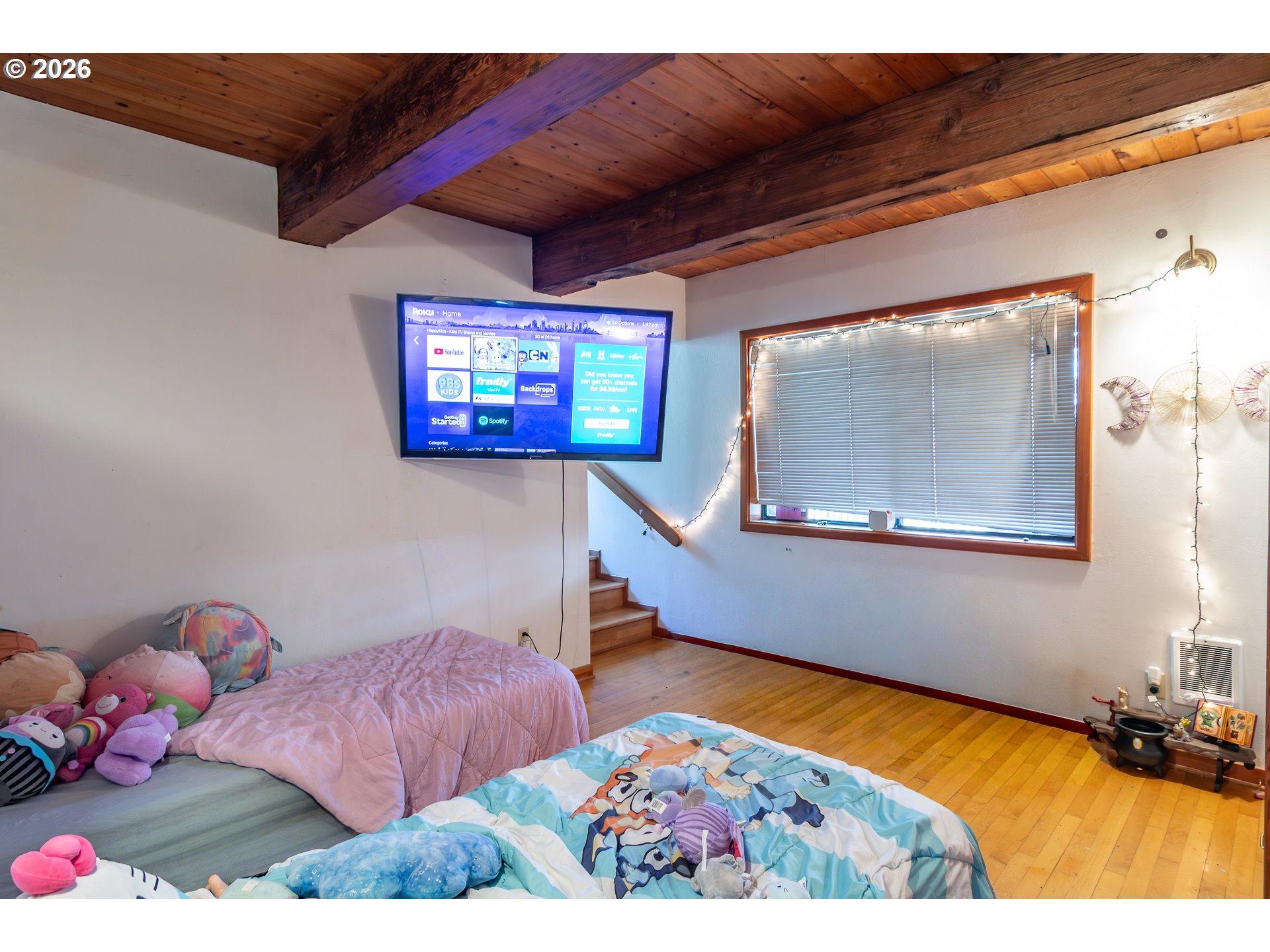 4890 Henderer Road Elkton, OR 97436 - Photo 7 of 48 a view of room with toys and wooden floor