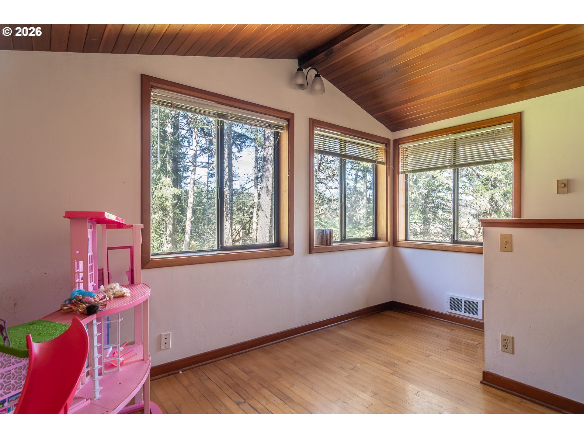 4890 Henderer Road Elkton, OR 97436 - Photo 10 of 48 a very nice looking room with a large window