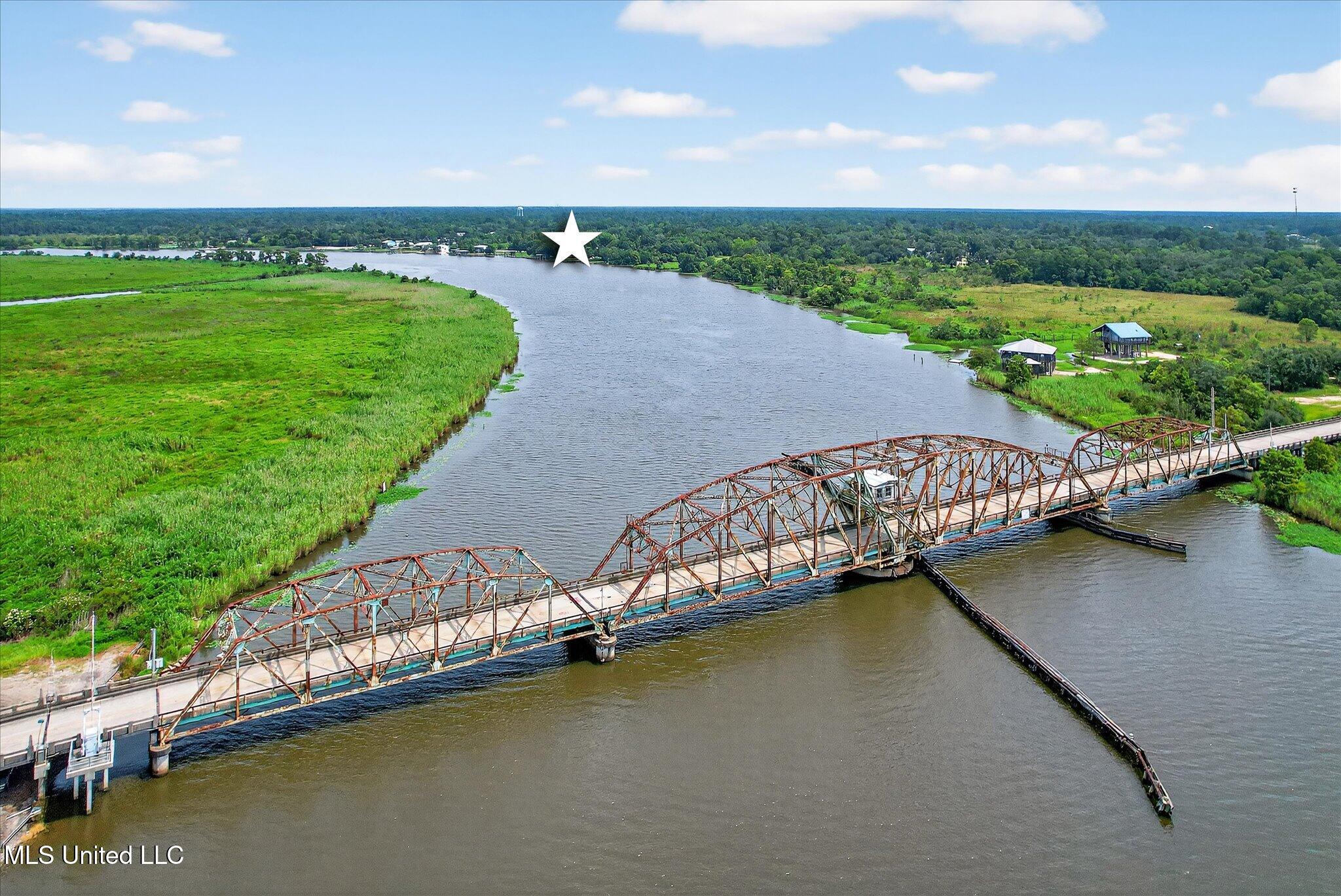 Washington Street Pearlington, MS 39572 - Photo 3 of 5 51-047_5033LeveePearlington_m