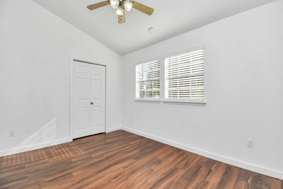 2002 Gentryside Drive, Unit 113 Houston, TX 77077 - Photo 17 of 36 wooden floor in an empty room with a window