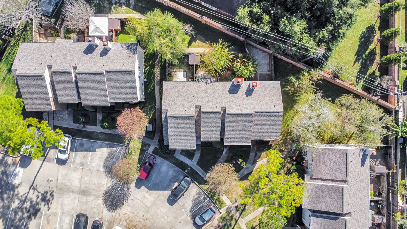 2002 Gentryside Drive, Unit 113 Houston, TX 77077 - Photo 35 of 36 an aerial view of a house with large trees