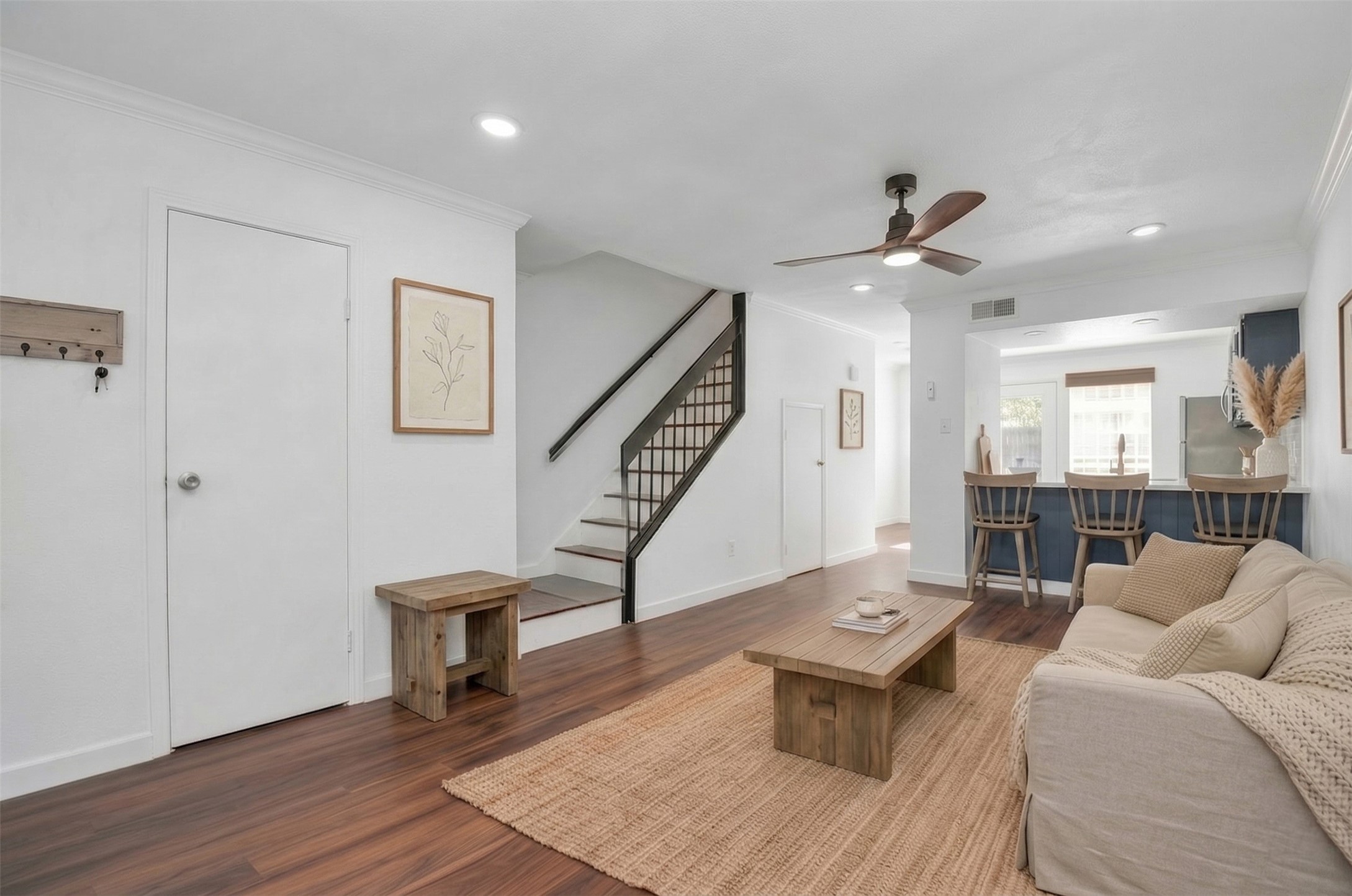 2002 Gentryside Drive, Unit 113 Houston, TX 77077 - Photo 4 of 36 a living room with furniture and a wooden floor