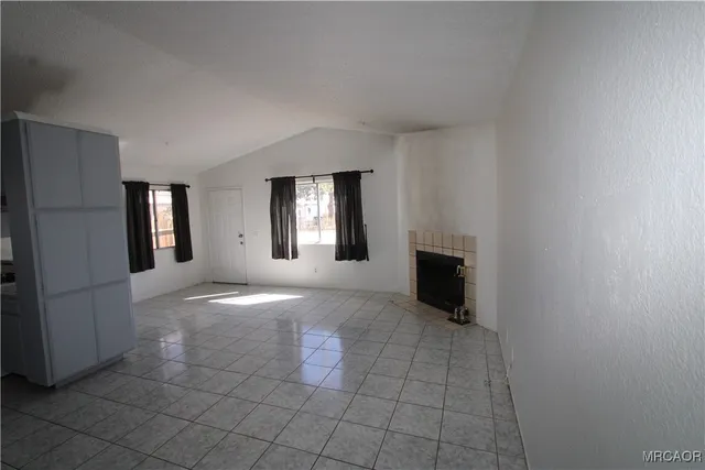 a view of a livingroom with a fireplace