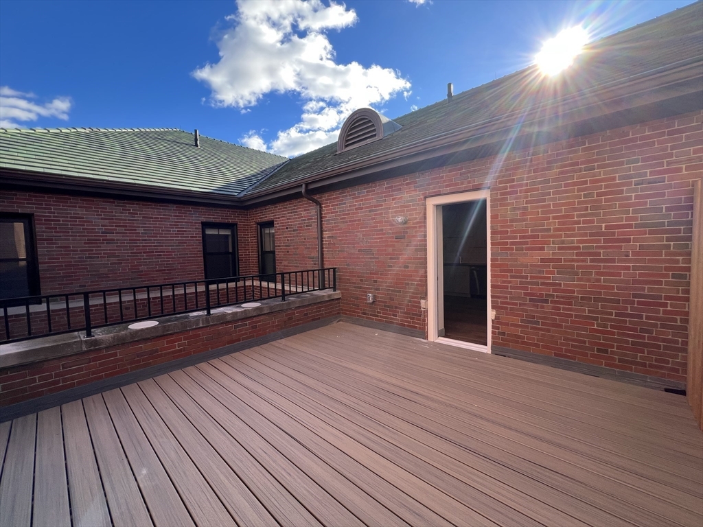 160 Seabury Street, Unit 12 Fall River, MA 02720 - Photo 5 of 11 a view of a house with a patio