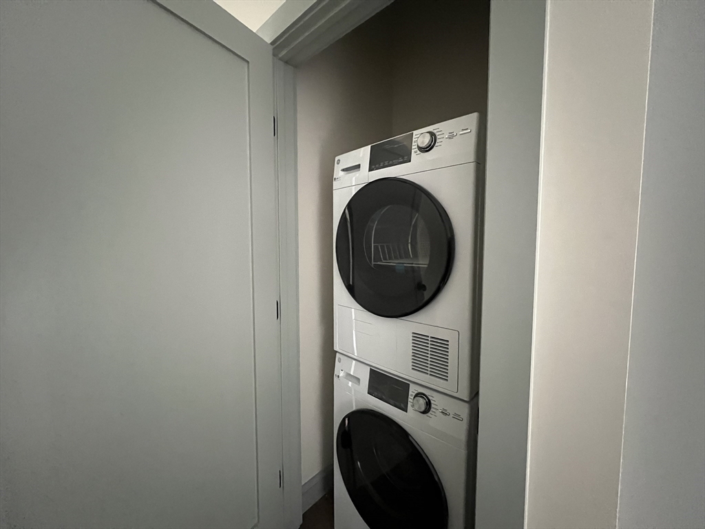 160 Seabury Street, Unit 12 Fall River, MA 02720 - Photo 7 of 11 a close up view of a washer and dryer in a utility room