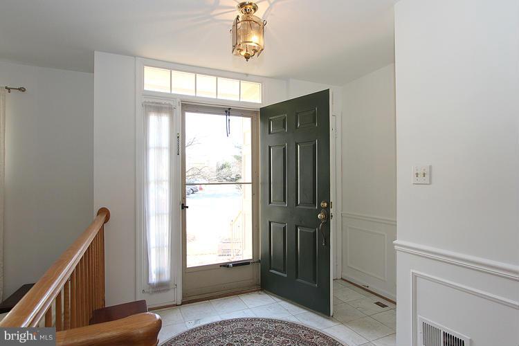 10922 Brewer House Road Rockville, MD 20852 - Photo 2 of 27 a view of an entryway with window