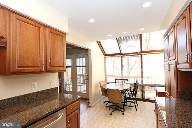 10922 Brewer House Road Rockville, MD 20852 - Photo 12 of 27 a view of a dining room with furniture window and outside view