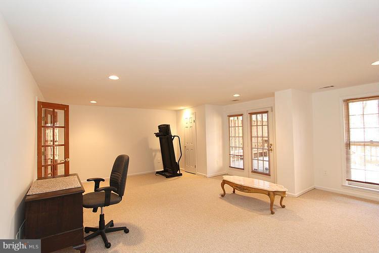 10922 Brewer House Road Rockville, MD 20852 - Photo 24 of 27 a view of a workspace with furniture and a window