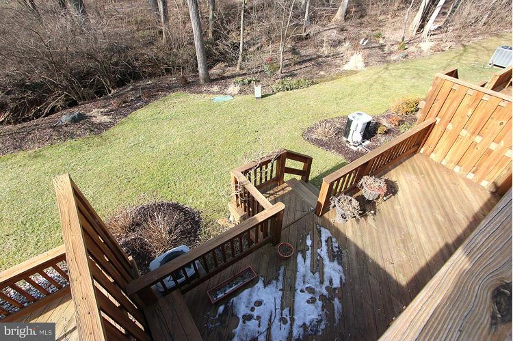 10922 Brewer House Road Rockville, MD 20852 - Photo 25 of 27 a view of a balcony with furniture