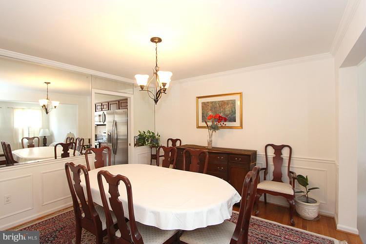 10922 Brewer House Road Rockville, MD 20852 - Photo 4 of 27 a view of a dining room with furniture