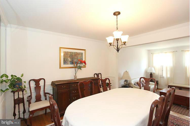 10922 Brewer House Road Rockville, MD 20852 - Photo 7 of 27 a view of a dining room with furniture