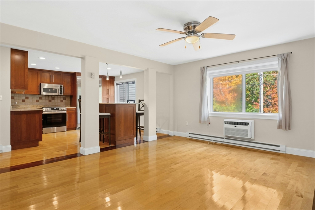 10 Erick Road, Unit 34 Mansfield, MA 02048 - Photo 4 of 24 a view of kitchen with furniture and a ceiling fan