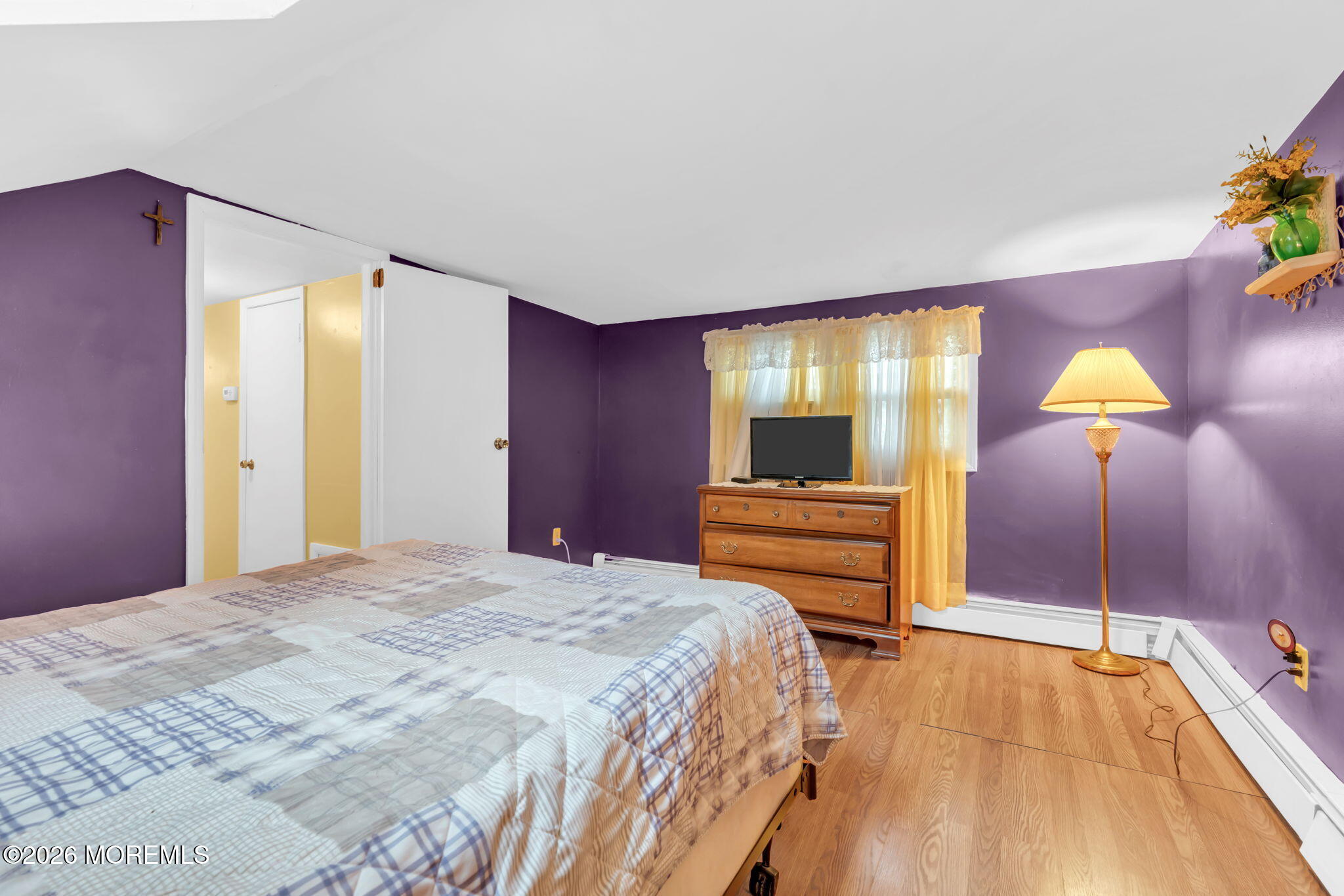 109 Martin Road Toms River, NJ 08753 - Photo 28 of 34 a bedroom with a bed and a lamp on dresser