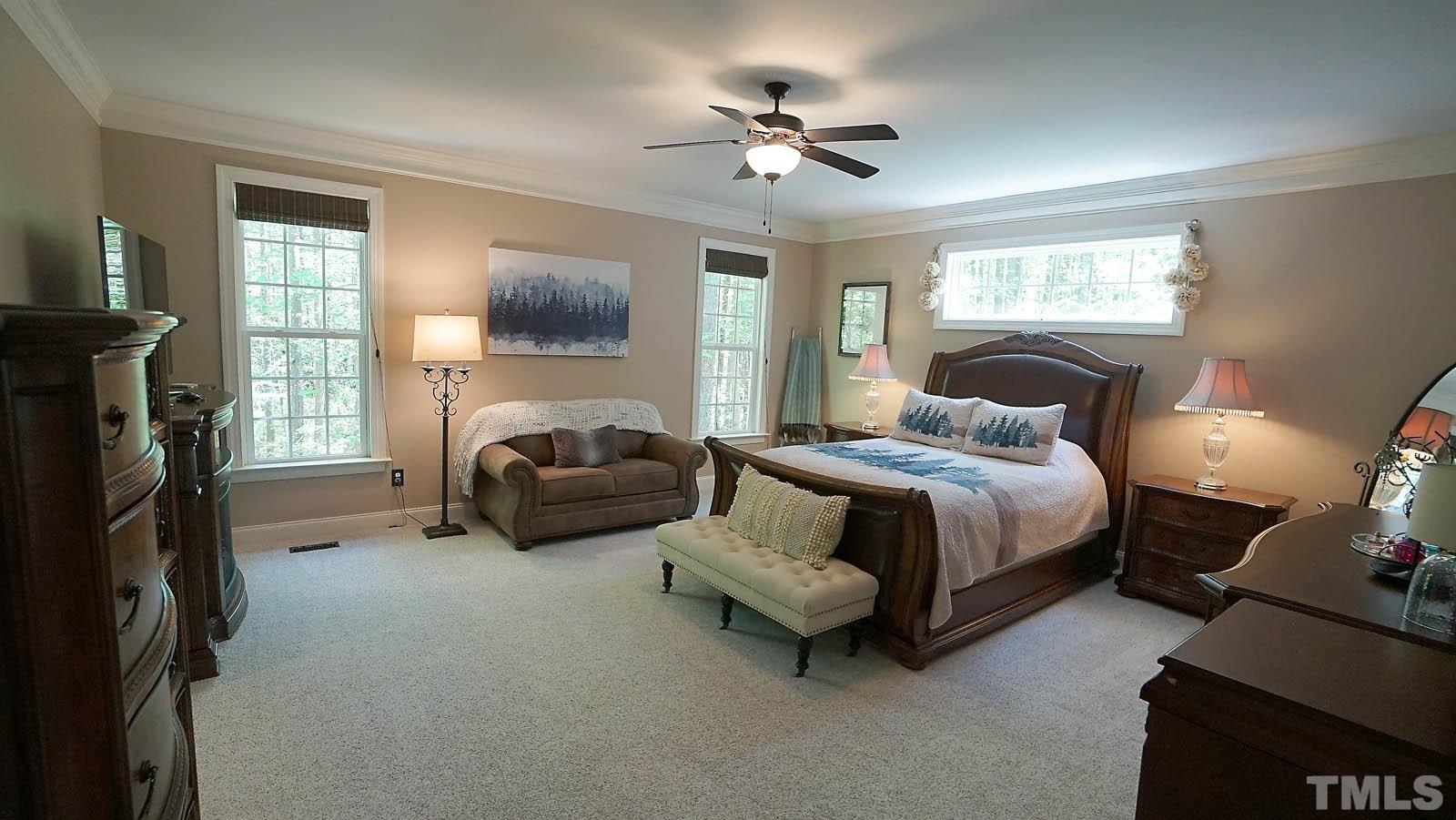 275 Hawfields Drive Pittsboro, NC 27312 - Photo 20 of 44 a bedroom with bed and window