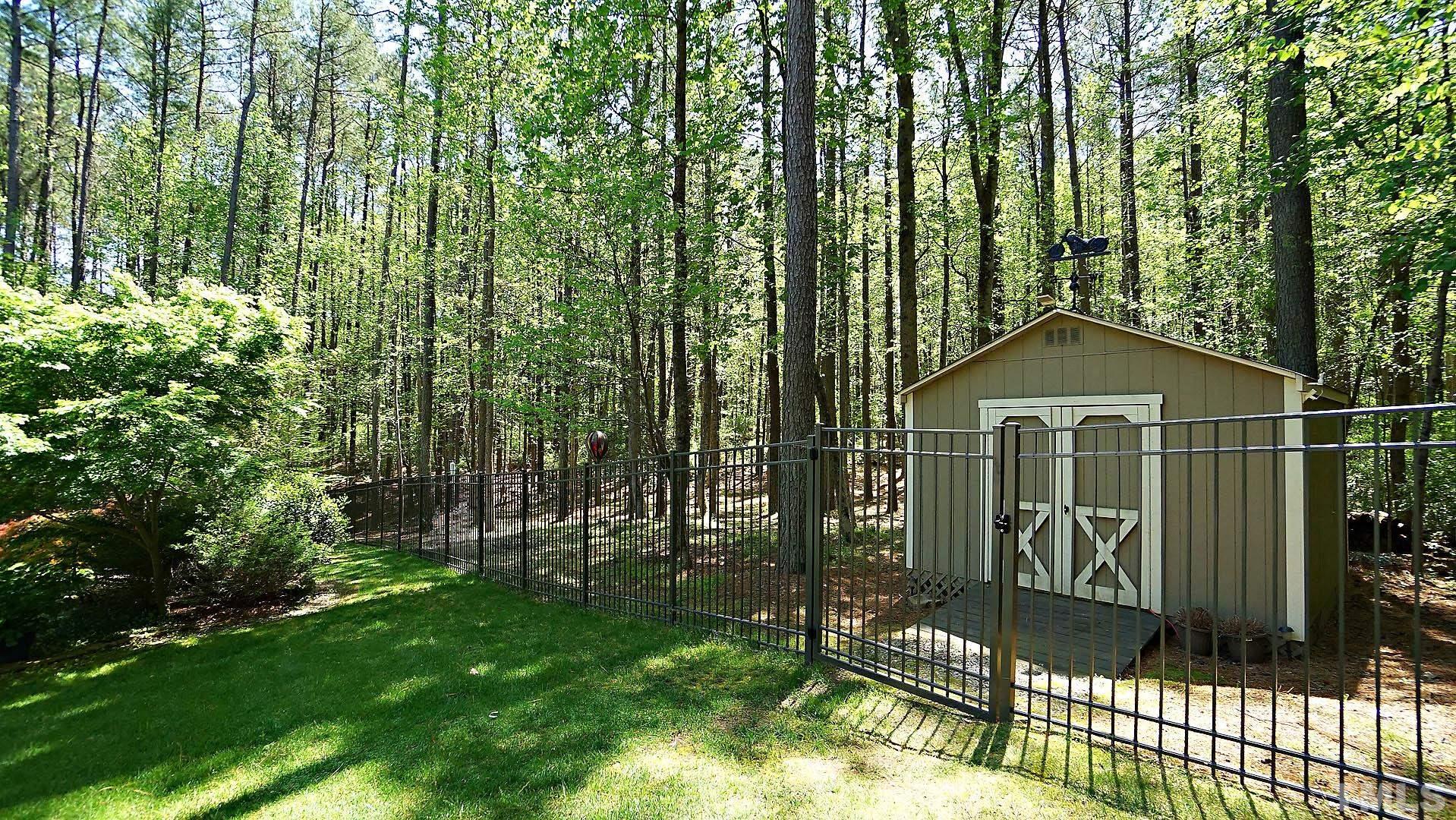 275 Hawfields Drive Pittsboro, NC 27312 - Photo 26 of 44 a view of a small garden