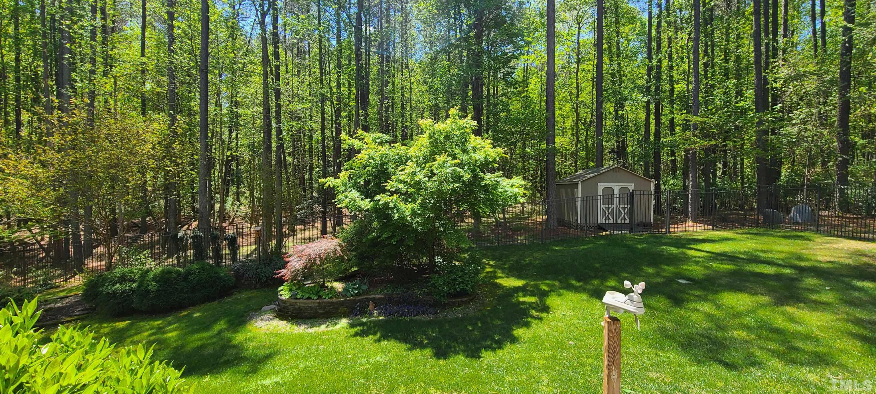 275 Hawfields Drive Pittsboro, NC 27312 - Photo 2 of 44 a view of a back yard