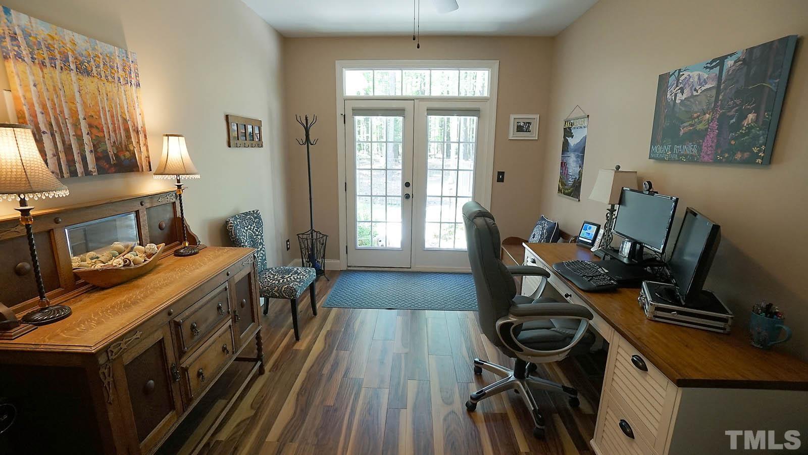 275 Hawfields Drive Pittsboro, NC 27312 - Photo 35 of 44 a view of a workspace with furniture and a window