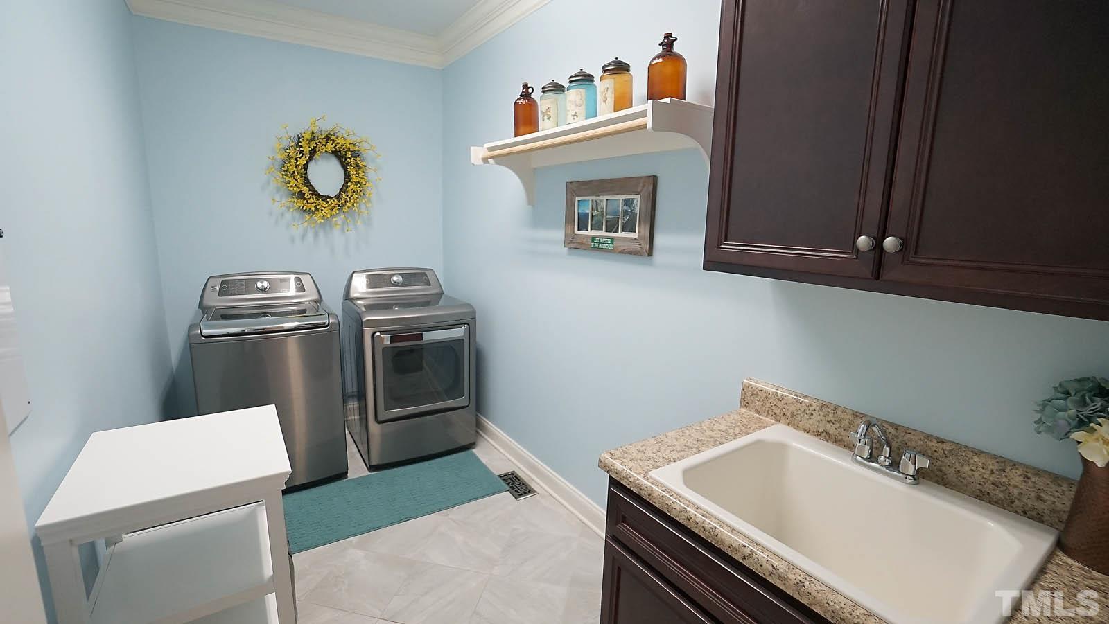 275 Hawfields Drive Pittsboro, NC 27312 - Photo 36 of 44 a kitchen with a sink and a stove top oven