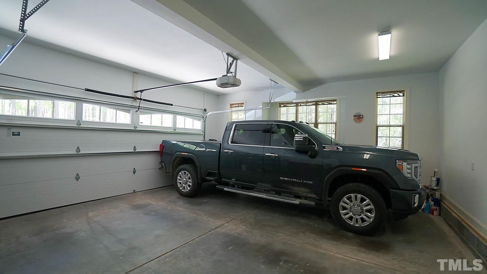 275 Hawfields Drive Pittsboro, NC 27312 - Photo 38 of 44 a car parked in a garage