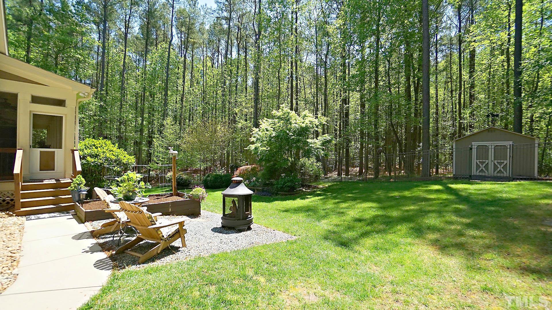 275 Hawfields Drive Pittsboro, NC 27312 - Photo 3 of 44 a view of backyard with sitting area